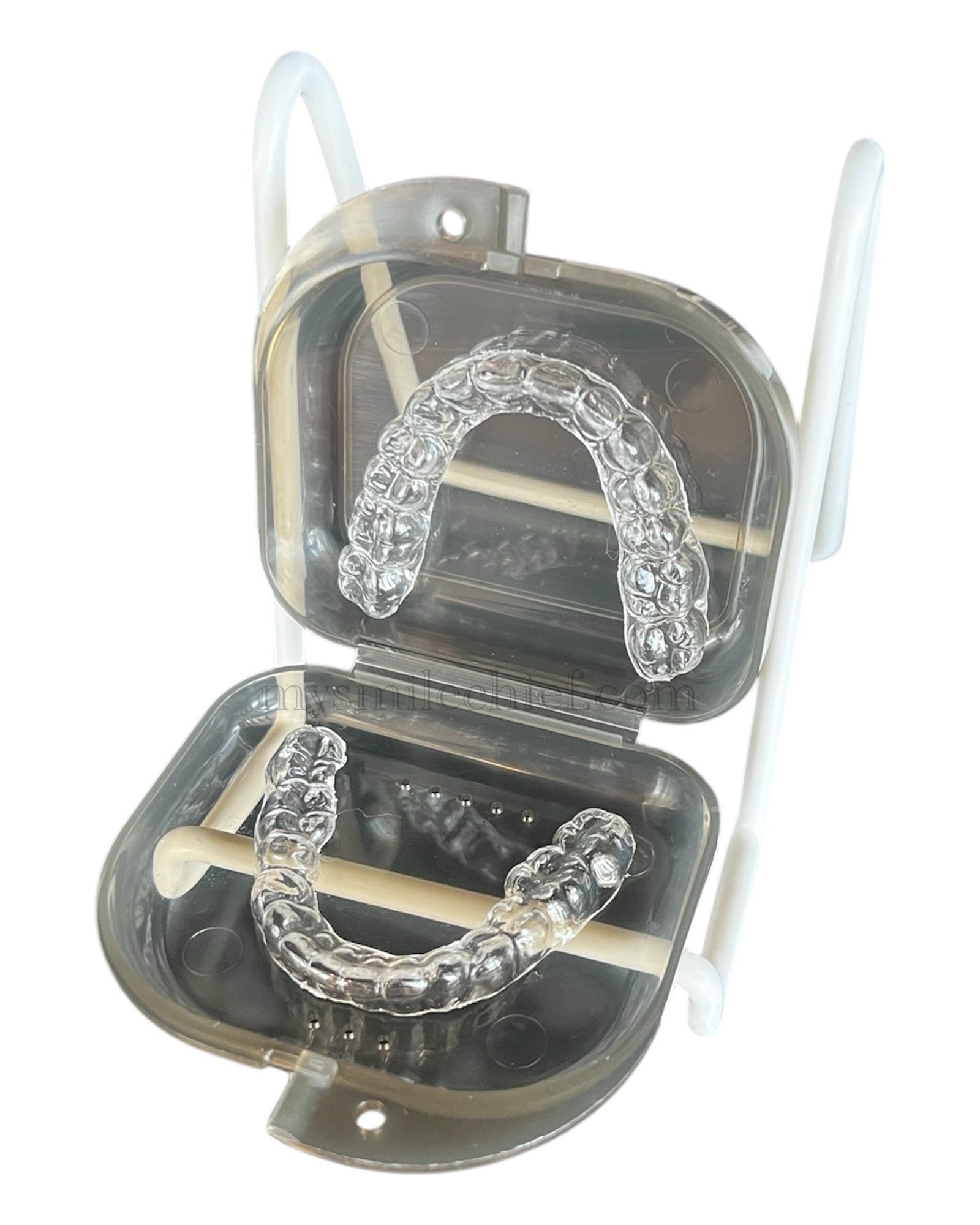 Upper and lower clear retainers shown in a gray transparent box