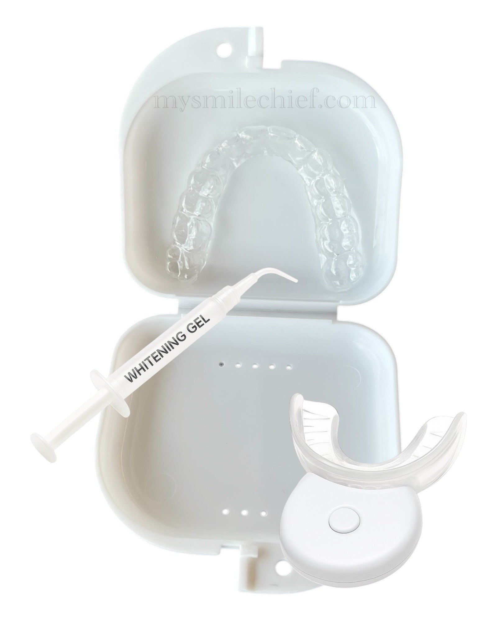 Custom upper whitening tray in white box with gel syringe and home LED whitening light
